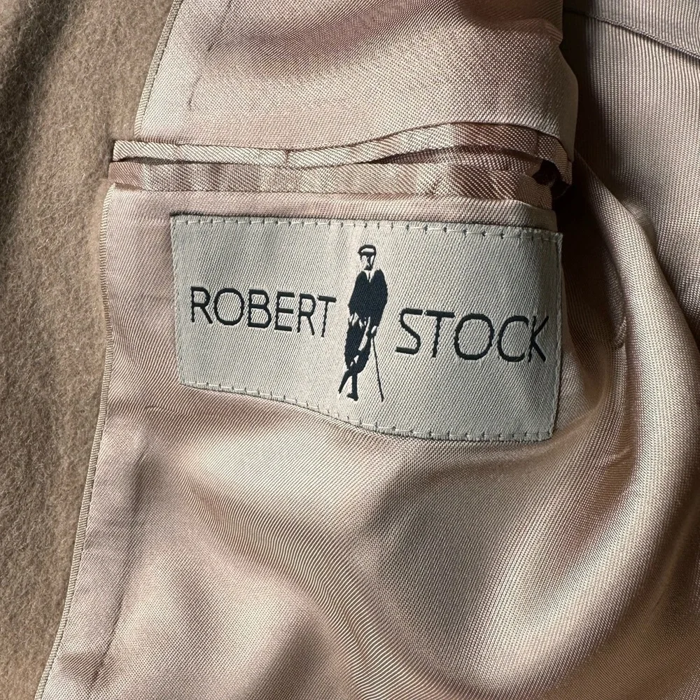 Brand: Robert Stock  Tan blazer with a 2 button closure, 2 front pockets.